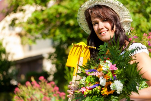 Safe and organized landscaping site with workers using protective equipment